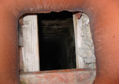 top down view into chimney flue during sweep service