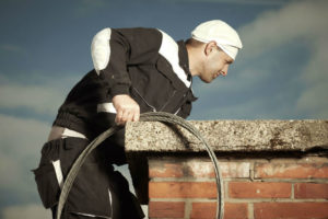 sweep looking into a chimney