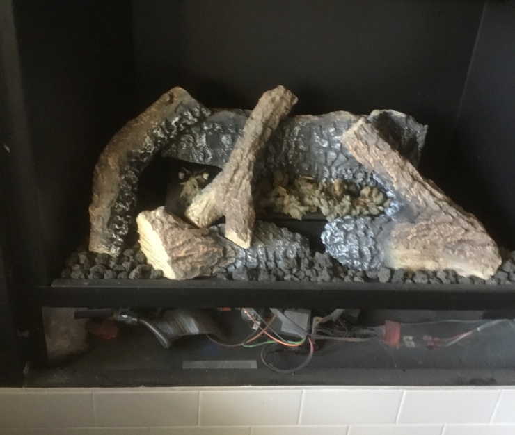 gas fireplace logs tall chimney photo